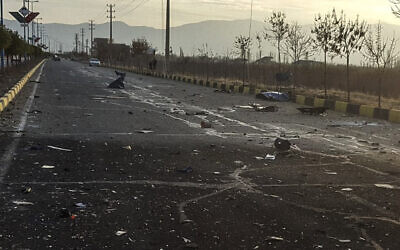 This photo released by the semi-official Fars News Agency shows the scene where Mohsen Fakhrizadeh was killed in Absard, a small city just east of the capital, Tehran, Iran, Friday, Nov. 27, 2020 (Fars News Agency via AP)