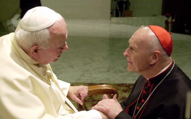 US Cardinal Theodore Edgar McCarrick, archbishop of Washington, DC (left) shakes hands with Pope John Paul II during the General Audience with the newly appointed cardinals in the Paul VI hall at the Vatican, February 23, 2001 (AP Photo/Massimo Sambucetti) US Cardinal Theodore Edgar McCarrick, archbishop of Washington, DC (left) shakes hands with Pope John Paul II during the General Audience with the newly appointed cardinals in the Paul VI hall at the Vatican, February 23, 2001 (AP Photo/Massimo Sambucetti)