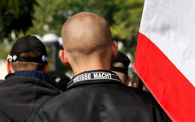 Illustrative: A man wears a jacket with writing on the collar which reads 'White Power' at a neo-Nazi rally in Berlin, October 10, 2009. (AP Photo) Illustrative: A man wears a jacket with writing on the collar which reads 'White Power' at a neo-Nazi rally in Berlin, October 10, 2009. (AP Photo)