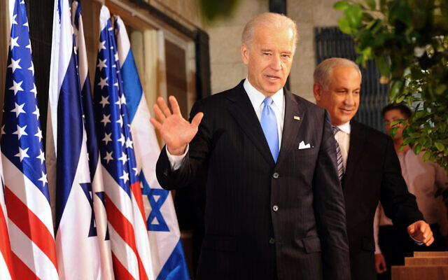 Then-US vice president Joe Biden waves as he and Prime Minister Benjamin Netanyahu walk to give statements to the press in Jerusalem, Tuesday, March 9, 2010. (AP Photo/Debbie Hill, Pool) Then-US vice president Joe Biden waves as he and Prime Minister Benjamin Netanyahu walk to give statements to the press in Jerusalem, Tuesday, March 9, 2010. (AP Photo/Debbie Hill, Pool)