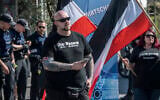 Illustrative -- A man participates in a demonstration of the German far-right party 'Die Rechte' in Ingelheim, Germany, April 20, 2019. (Boris Roessler/dpa via AP)