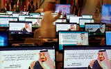 Illustrative: Screensavers showing King Salman are visible on computers at the press center for upcoming summits, in Mecca, Saudi Arabia, Thursday, May 30, 2019. Arabic on computers reads, "Despite all the challenges facing our Arab nation. We are optimistic about a promising future that fulfills the hopes of our nations for leadership." (AP Photo/Amr Nabil)