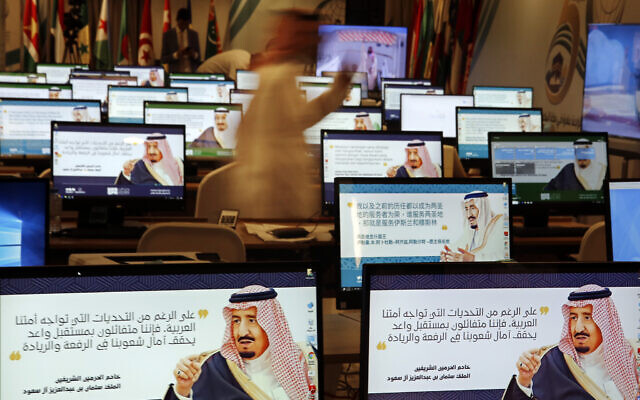 Illustrative: Screensavers showing King Salman are visible on computers at the press center for upcoming summits, in Mecca, Saudi Arabia, Thursday, May 30, 2019. Arabic on computers reads, "Despite all the challenges facing our Arab nation. We are optimistic about a promising future that fulfills the hopes of our nations for leadership." (AP Photo/Amr Nabil) Illustrative: Screensavers showing King Salman are visible on computers at the press center for upcoming summits, in Mecca, Saudi Arabia, Thursday, May 30, 2019. Arabic on computers reads, "Despite all the challenges facing our Arab nation. We are optimistic about a promising future that fulfills the hopes of our nations for leadership." (AP Photo/Amr Nabil)