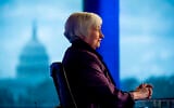The Capitol Dome is visible in the window behind former Fed Chair Janet Yellen as she appears for an interview with FOX Business Network guest anchor Jon Hilsenrath in the Fox Washington bureau, Wednesday, Aug. 14, 2019, in Washington. (AP Photo/Andrew Harnik)