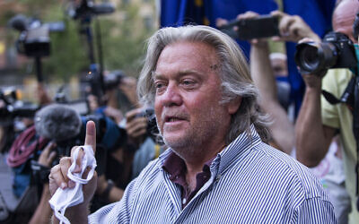 US President Donald Trump's former chief strategist Steve Bannon speaks with reporters after pleading not guilty to charges that he ripped off donors to an online fundraising scheme to build a southern border wall, Thursday, Aug. 20, 2020, in New York. (AP Photo/Eduardo Munoz Alvarez)