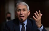Dr. Anthony Fauci, Director of the US National Institute of Allergy and Infectious Diseases at the National Institutes of Health, listens during a Senate Senate Health, Education, Labor, and Pensions Committee Hearing on the federal government response to COVID-19 Capitol Hill on September 23, 2020, in Washington. (Graeme Jennings/Pool via AP)
