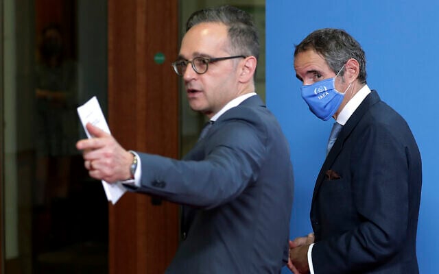 Rafael Mariano Grossi, right, director general of International Atomic Energy Agency (IAEA) and German Foreign Minister Heiko Maas, left, leave after a press conference as part of a meeting in Berlin, Germany, Oct. 26, 2020. (AP/Michael Sohn, pool) Rafael Mariano Grossi, right, director general of International Atomic Energy Agency (IAEA) and German Foreign Minister Heiko Maas, left, leave after a press conference as part of a meeting in Berlin, Germany, Oct. 26, 2020. (AP/Michael Sohn, pool)