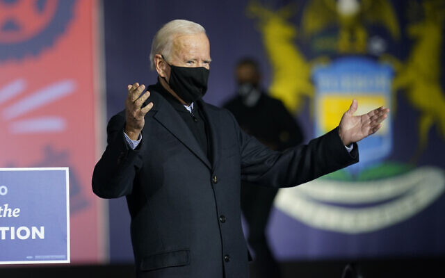 Democratic presidential candidate former vice president Joe Biden arrives to speak at a rally at Belle Isle Casino in Detroit, Michigan, October 31, 2020. (Andrew Harnik/ AP) Democratic presidential candidate former vice president Joe Biden arrives to speak at a rally at Belle Isle Casino in Detroit, Michigan, October 31, 2020. (Andrew Harnik/ AP)