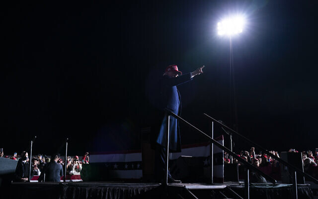 US President Donald Trump walks off stage after speaking during a campaign rally at Richard B. Russell Airport, Sunday, Nov. 1, 2020, in Rome, Ga. (AP Photo/Evan Vucci) US President Donald Trump walks off stage after speaking during a campaign rally at Richard B. Russell Airport, Sunday, Nov. 1, 2020, in Rome, Ga. (AP Photo/Evan Vucci)