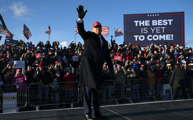 US President Donald Trump walks off stage after speaking during a campaign rally at Wilkes-Barre Scranton International Airport, Monday, Nov. 2, 2020, in Avoca, Pa. (AP Photo/Evan Vucci) US President Donald Trump walks off stage after speaking during a campaign rally at Wilkes-Barre Scranton International Airport, Monday, Nov. 2, 2020, in Avoca, Pa. (AP Photo/Evan Vucci)