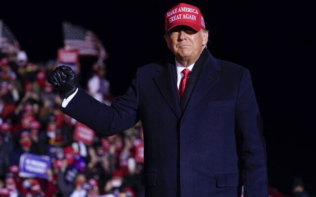 US President Donald Trump arrives for a campaign rally at Kenosha Regional Airport, Monday, Nov. 2, 2020, in Kenosha, Wis. (AP Photo/Evan Vucci)