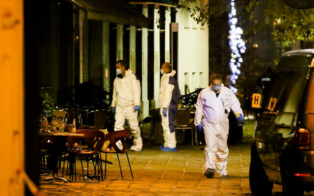 Investigators at the scene following a shooting attack in the Austrian capital Vienna, November 3, 2020. (Ronald Zak/AP)