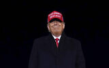 US President Donald Trump smiles at supporters after a campaign rally at Gerald R. Ford International Airport, November 3, 2020, in Grand Rapids, Michigan. (AP Photo/Evan Vucci)