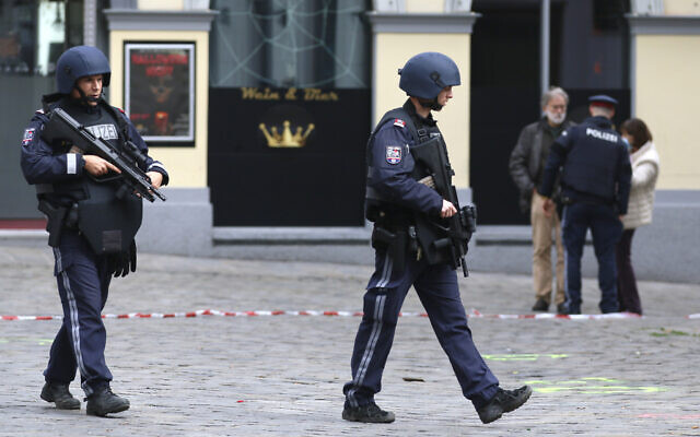 After a shooting armed police officers patrol on a street at the scene in Vienna, Austria, Nov. 3, 2020 (AP Photo/Ronald Zak) After a shooting armed police officers patrol on a street at the scene in Vienna, Austria, Nov. 3, 2020 (AP Photo/Ronald Zak)