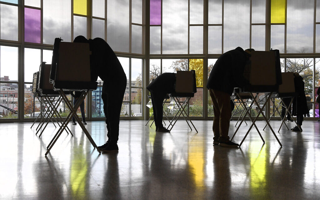 Voters mark their ballots at First Presbyterian Church on Election Day, Tuesday, Nov. 3, 2020, in Stamford, Conn. (AP/Jessica Hill)