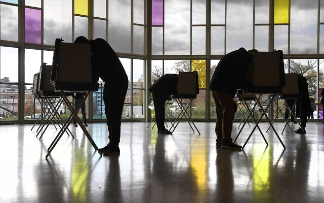 Voters mark their ballots at First Presbyterian Church on Election Day, Tuesday, Nov. 3, 2020, in Stamford, Conn. (AP/Jessica Hill)