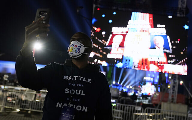 People arrive for an election night rally for Democratic presidential candidate former Vice President Joe Biden on Tuesday, Nov. 3, 2020, in Wilmington, Del. (AP Photo/Andrew Harnik) People arrive for an election night rally for Democratic presidential candidate former Vice President Joe Biden on Tuesday, Nov. 3, 2020, in Wilmington, Del. (AP Photo/Andrew Harnik)