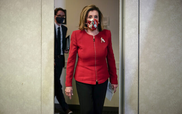 Speaker of the US House Nancy Pelosi, D-Calif., arrives to talk to reporters about Election Day results in races for the House of Representatives, at Democratic National Committee headquarters in Washington, Nov. 3, 2020. (AP Photo/J. Scott Applewhite, Pool) Speaker of the US House Nancy Pelosi, D-Calif., arrives to talk to reporters about Election Day results in races for the House of Representatives, at Democratic National Committee headquarters in Washington, Nov. 3, 2020. (AP Photo/J. Scott Applewhite, Pool)
