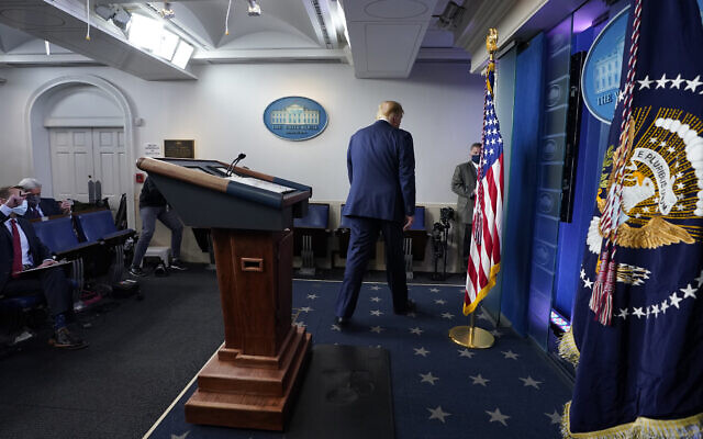 US President Donald Trump walks away after speaking at the White House, Nov. 5, 2020, in Washington. (AP Photo/Evan Vucci) US President Donald Trump walks away after speaking at the White House, Nov. 5, 2020, in Washington. (AP Photo/Evan Vucci)