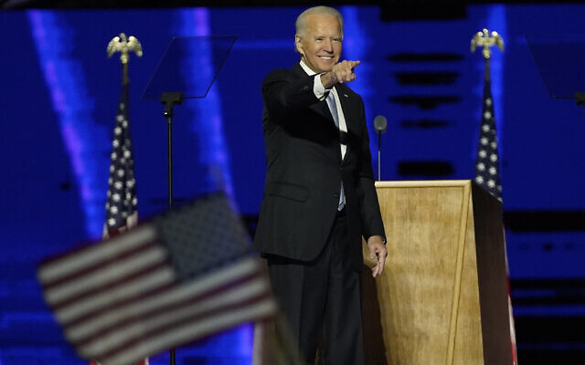 President-elect Joe Biden gestures on stage after speaking, Saturday, Nov. 7, 2020, in Wilmington, Del. (AP Photo/Andrew Harnik, Pool) President-elect Joe Biden gestures on stage after speaking, Saturday, Nov. 7, 2020, in Wilmington, Del. (AP Photo/Andrew Harnik, Pool)