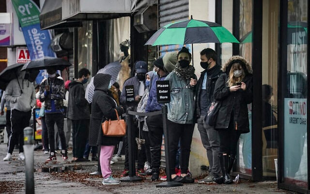 People wait on line outside a City MD Urgent Care clinic, a designated COVID-19 testing center, Nov. 13, 2020, in New York (AP Photo/Bebeto Matthews) People wait on line outside a City MD Urgent Care clinic, a designated COVID-19 testing center, Nov. 13, 2020, in New York (AP Photo/Bebeto Matthews)