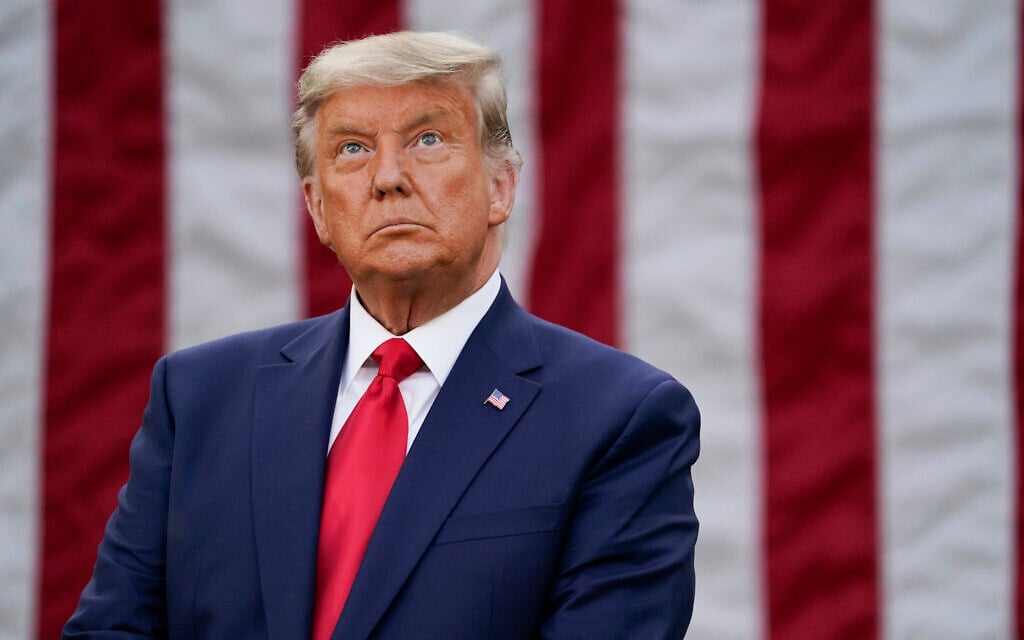 US President Donald Trump listens during an event on Operation Warp Speed in the Rose Garden of the White House, Nov. 13, 2020, in Washington. (AP Photo/Evan Vucci) US President Donald Trump listens during an event on Operation Warp Speed in the Rose Garden of the White House, Nov. 13, 2020, in Washington. (AP Photo/Evan Vucci)