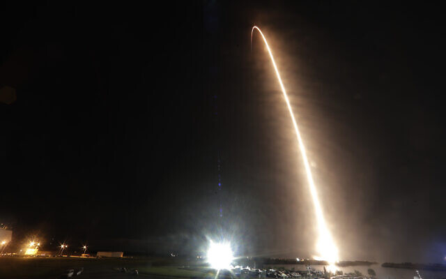 A Falcon 9 SpaceX rocket with the Crew Dragon capsule is seen during a time exposure as it lifts off from pad 39A at the Kennedy Space Center in Cape Canaveral, Fla., Sunday, Nov. 15, 2020. Four astronauts are beginning a mission to the International Space Station. (AP Photo/John Raoux) A Falcon 9 SpaceX rocket with the Crew Dragon capsule is seen during a time exposure as it lifts off from pad 39A at the Kennedy Space Center in Cape Canaveral, Fla., Sunday, Nov. 15, 2020. Four astronauts are beginning a mission to the International Space Station. (AP Photo/John Raoux)