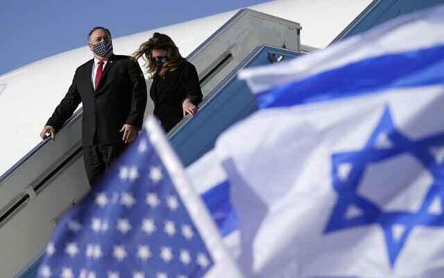 US Secretary of State Mike Pompeo and his wife Susan step off a plane at Ben Gurion Airport in Tel Aviv, Nov. 18, 2020 (AP Photo/Patrick Semansky, Pool) US Secretary of State Mike Pompeo and his wife Susan step off a plane at Ben Gurion Airport in Tel Aviv, Nov. 18, 2020 (AP Photo/Patrick Semansky, Pool)