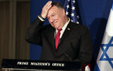 US Secretary of State Mike Pompeo pats his head during a joint press conference with Benjamin Netanyahu and Bahrain's Foreign Minister Abdullatif bin Rashid Alzayani after their trilateral meeting in Jerusalem on Wednesday, Nov. 18, 2020. (Menahem Kahana/Pool via AP)