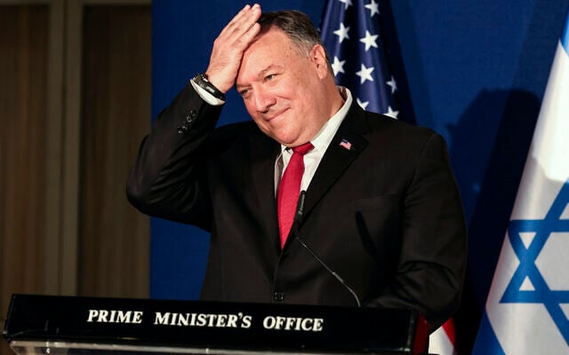 US Secretary of State Mike Pompeo pats his head during a joint press conference with Benjamin Netanyahu and Bahrain's Foreign Minister Abdullatif bin Rashid Alzayani after their trilateral meeting in Jerusalem on Wednesday, Nov. 18, 2020. (Menahem Kahana/Pool via AP) US Secretary of State Mike Pompeo pats his head during a joint press conference with Benjamin Netanyahu and Bahrain's Foreign Minister Abdullatif bin Rashid Alzayani after their trilateral meeting in Jerusalem on Wednesday, Nov. 18, 2020. (Menahem Kahana/Pool via AP)