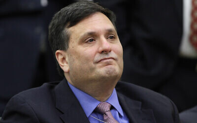Outgoing Ebola czar Ron Klain listens as President Barack Obama speaks about the Ebola outbreak response by the US in West Africa, Wednesday, Feb. 11, 2015, in the South Court Auditorium of the White House complex in Washington. Obama plans to withdraw most US military troops fighting Ebola outbreak in West Africa. (AP Photo/Jacquelyn Martin)