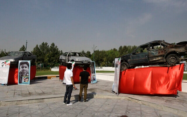 Damaged cars that three Iranian scientists, Masoud Ali Mohammadi, right, Majid Shahriari, center, and Mostafa Ahmadi Roshan, were riding in when they were killed in bombings are displayed outside a conference hall hosting the meeting of Non-Aligned Movement, NAM, in Tehran, Iran, Sunday, Aug. 26, 2012 (AP Photo/Vahid Salemi) Damaged cars that three Iranian scientists, Masoud Ali Mohammadi, right, Majid Shahriari, center, and Mostafa Ahmadi Roshan, were riding in when they were killed in bombings are displayed outside a conference hall hosting the meeting of Non-Aligned Movement, NAM, in Tehran, Iran, Sunday, Aug. 26, 2012 (AP Photo/Vahid Salemi)