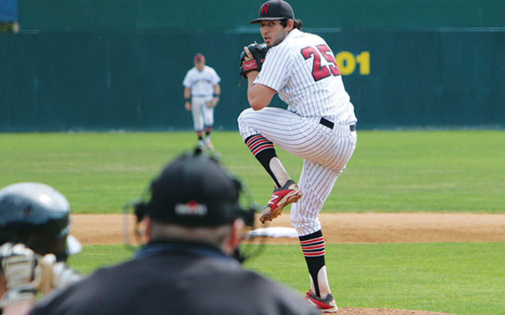 Sammy Elias pitches for his college team at Wesleyan. (Courtesy of Elias/ via the Jewish Standard)