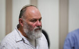 Chairman of the Afek oil drilling company, Effi Eitam, seen at the Supreme Court during a hearing on oil searching in the Golan Heights, on December 23, 2014, in Jerusalem. (Flash90)