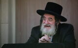 Rabbi Yisroel Hager, the head of Vizhnitz Hasidic dynasty, speaks to his followers in the northern city of Safed on August 14, 2020. (David Cohen/Flash90)