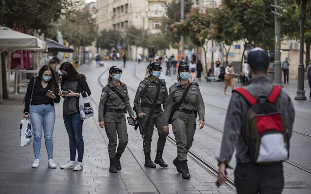 Border Police officers walk on Jaffa Road, in downtown Jerusalem, on November 1, 2020. (Olivier Fitoussi/Flash90) Border Police officers walk on Jaffa Road, in downtown Jerusalem, on November 1, 2020. (Olivier Fitoussi/Flash90)