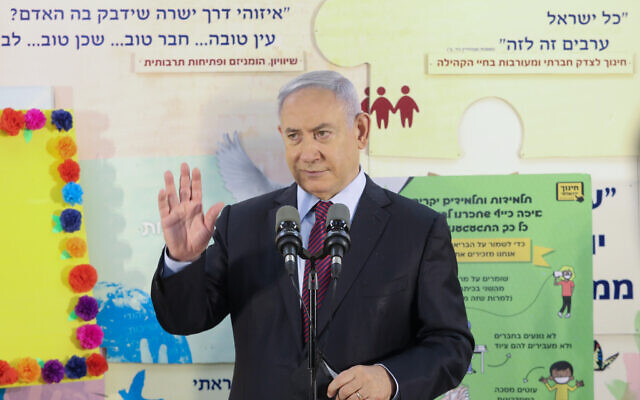 Prime Minister Benjamin Netanyahu visits visiting the Tali Bayit Vegan elementary school in Jerusalem, on September 5, 2020. (Marc Israel Sellem/POOL/Flash90) Prime Minister Benjamin Netanyahu visits visiting the Tali Bayit Vegan elementary school in Jerusalem, on September 5, 2020. (Marc Israel Sellem/POOL/Flash90)