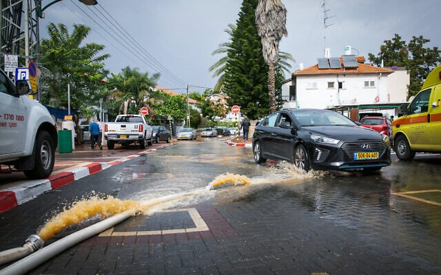 Flooded street in Ness Ziona, November 21, 2020 (Yossi Aloni/Flash90) Flooded street in Ness Ziona, November 21, 2020 (Yossi Aloni/Flash90)