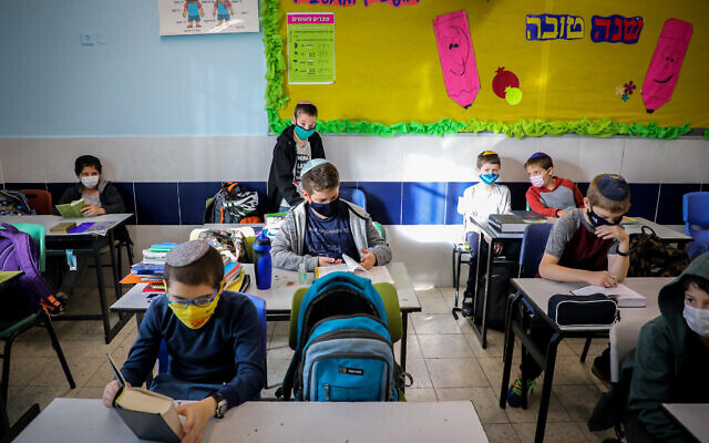 Students seen in a classroom at Orot Etzion School, in the settlement of Efrat, in the West Bank on November 24, 2020. (Gershon Elinson/Flash90) Students seen in a classroom at Orot Etzion School, in the settlement of Efrat, in the West Bank on November 24, 2020. (Gershon Elinson/Flash90)