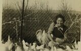 Hannah Senesh with chickens on Moshav Nahalal, part of the Hannah Senesh Collection that is now part of Israel's National Library (Courtesy National Library of Israel)