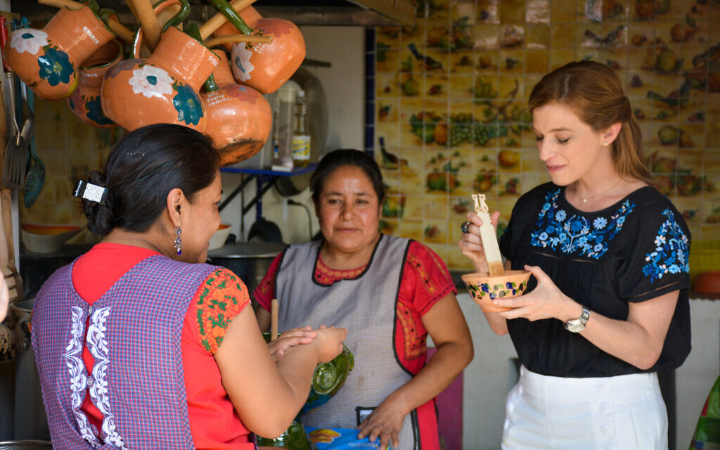 Celebrity chef Pati Jinich works with a mortar and pestle in Oaxaca. (Courtesy Jinich)