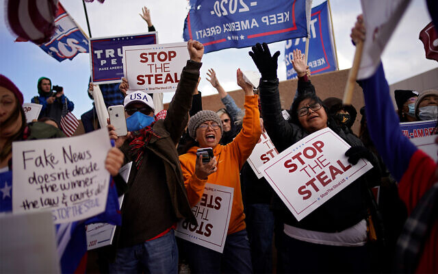 Supporters of US President Donald Trump protest the election outside of the Clark County Election Department in North Las Vegas, Nevada, Nov. 8, 2020. (AP Photo/John Locher) Supporters of US President Donald Trump protest the election outside of the Clark County Election Department in North Las Vegas, Nevada, Nov. 8, 2020. (AP Photo/John Locher)