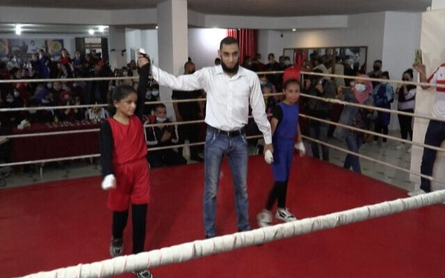 Girls compete in a boxing tournament in Gaza, November 20, 2020. (Screenshot/ AFP) Girls compete in a boxing tournament in Gaza, November 20, 2020. (Screenshot/ AFP)
