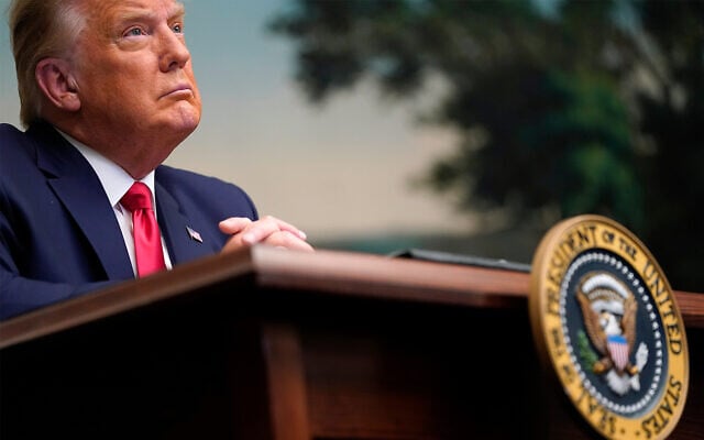 US President Donald Trump participates in a video teleconference call with members of the military on Thanksgiving, Nov. 26, 2020, at the White House in Washington. (AP Photo/Patrick Semansky) US President Donald Trump participates in a video teleconference call with members of the military on Thanksgiving, Nov. 26, 2020, at the White House in Washington. (AP Photo/Patrick Semansky)