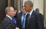 Russian President Vladimir Putin, left, speaks with then US President Barack Obama in Hangzhou in eastern China's Zhejiang province, Sept. 5, 2016. (Alexei Druzhinin/Sputnik, Kremlin Pool Photo via AP)
