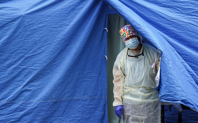 A testing tent at a COVID-19 mobile testing site in the Brooklyn borough of New York, Nov. 11, 2020. (AP Photo/John Minchillo, File) A testing tent at a COVID-19 mobile testing site in the Brooklyn borough of New York, Nov. 11, 2020. (AP Photo/John Minchillo, File)