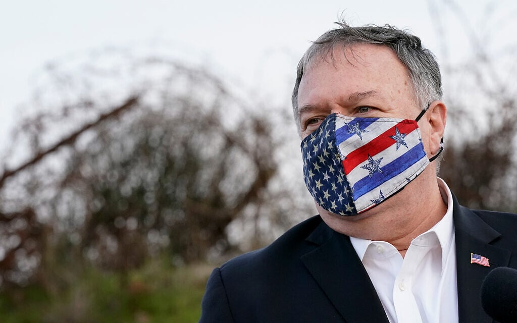 US Secretary of State Mike Pompeo listens as Foreign Minister Gabi Ashkenazi (off camera) speaks after a security briefing on Mount Bental in the Golan Heights, Nov. 19, 2020. (AP Photo/Patrick Semansky, Pool) US Secretary of State Mike Pompeo listens as Foreign Minister Gabi Ashkenazi (off camera) speaks after a security briefing on Mount Bental in the Golan Heights, Nov. 19, 2020. (AP Photo/Patrick Semansky, Pool)