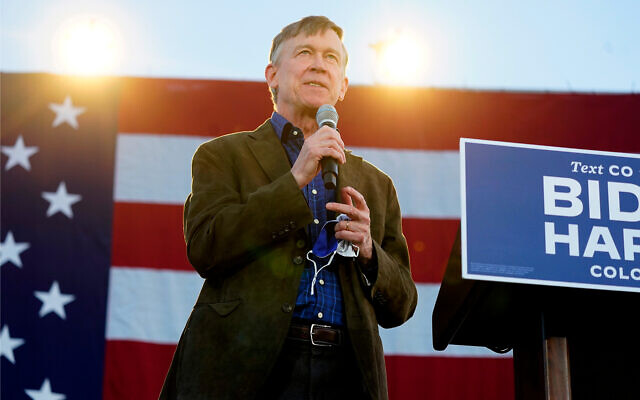 John Hickenlooper speaks at a rally in Denver, Colorado, Oct. 8, 2020. (AP Photo/David Zalubowski)