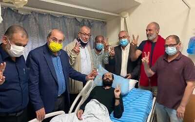 Parliamentrians from the largely Arab Joint List bloc gather in Palestinian security detainee Maher al-Akhras' room in Kaplan on Friday, November 6, 2020 to wish him well on the end of his hunger strike (Credit: Joint List spokesperson)