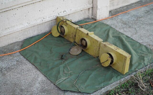 Three anti-personnel mines that Israel says were planted inside Israeli-controlled territory along the border with Syria, which were uncovered on November 17, 2020. (Israel Defense Forces) Three anti-personnel mines that Israel says were planted inside Israeli-controlled territory along the border with Syria, which were uncovered on November 17, 2020. (Israel Defense Forces)
